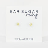 Pair of yellow earrings on a white background with 'Ear Sugar' branding.