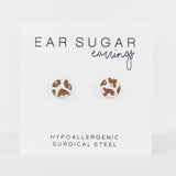 Ear sugar earrings with hypoallergenic surgical steel text on a white background