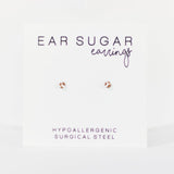 Earring display card with 'Ear Sugar' branding on a white background
