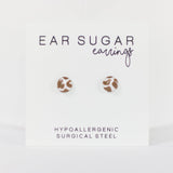 Ear sugar earrings on a white background with text indicating hypoallergenic and surgical steel material.