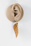 Brown weave faux leather and leopard leaf dangle earrings by Ear Sugar