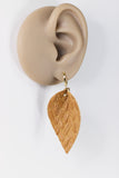 Brown weave faux leather and leopard leaf dangle earrings by Ear Sugar
