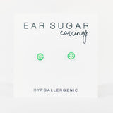 Text 'EAR SUGAR earrings' with two cucumber earrings and 'HYPOALLERGENIC' on a white background