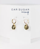 Gold coin earrings on a white card with 'Ear Sugar' branding.