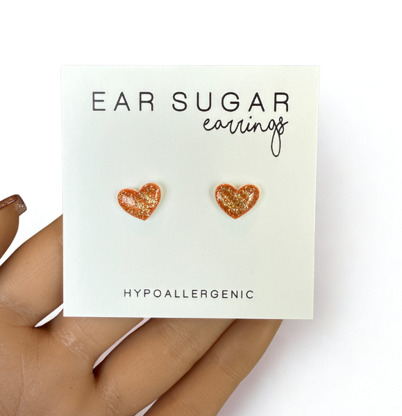 Orange heart glitter stud earrings hypoallergenic made in the USA by Ear Sugar