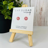 Tulip pink glitter round earrings by Ear Sugar made in the USA