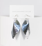 Pair of silver leaf-shaped earrings on a white card with 'Earsugarstud.com' branding.