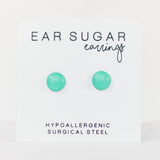 Turquoise earrings on a white background with 'Ear Sugar' branding.