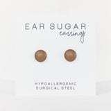 Brown round earrings on a white card with 'Ear Sugar' branding.