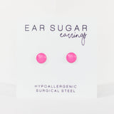 Pink ear sugar earrings on a white background with text indicating hypoallergenic and surgical steel material.