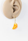 Cute orange slice hypoallergenic dangle earrings by Ear Sugar
