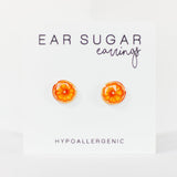 Orange sugar crystal earrings on a white background with 'Ear Sugar' branding.