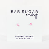 Earring packaging with 'Ear Sugar earrings' text on a white background