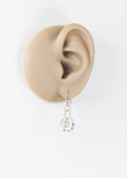Silver charm hoop hypoallergenic dangle earrings by Ear Sugar