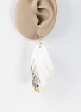 White floral faux leather dangle earrings by Ear Sugar