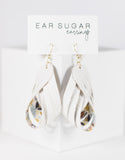 White floral faux leather dangle earrings by Ear Sugar