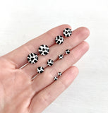 Cow print black and white studs hand painted earrings by Ear Sugar