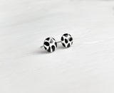 Cow print black and white studs hand painted earrings by Ear Sugar