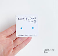 Cerulean blue little stud earrings by Ear Sugar