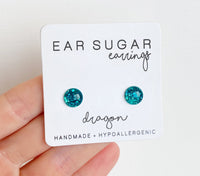 Dragon dark teal green glitter earrings by Ear Sugar hypoallergenic