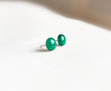 Emerald green glitter dot stud earrings by Ear Sugar hypoallergenic