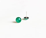 Emerald green glitter dot stud earrings by Ear Sugar hypoallergenic