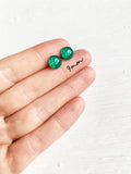 Emerald green glitter dot stud earrings by Ear Sugar hypoallergenic
