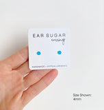 Poseidon blue surgical steel earrings by Ear Sugar made in the USA