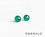 Emerald green glitter dot stud earrings by Ear Sugar hypoallergenic