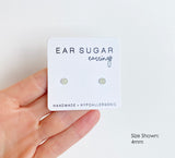 Pistachio green surgical steel earrings by Ear Sugar made in the USA