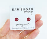 Pomegranate red shimmer surgical steel stud earrings by Ear Sugar