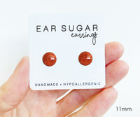 Spice deep orange shimmer stud earrings by Ear Sugar made in the USA